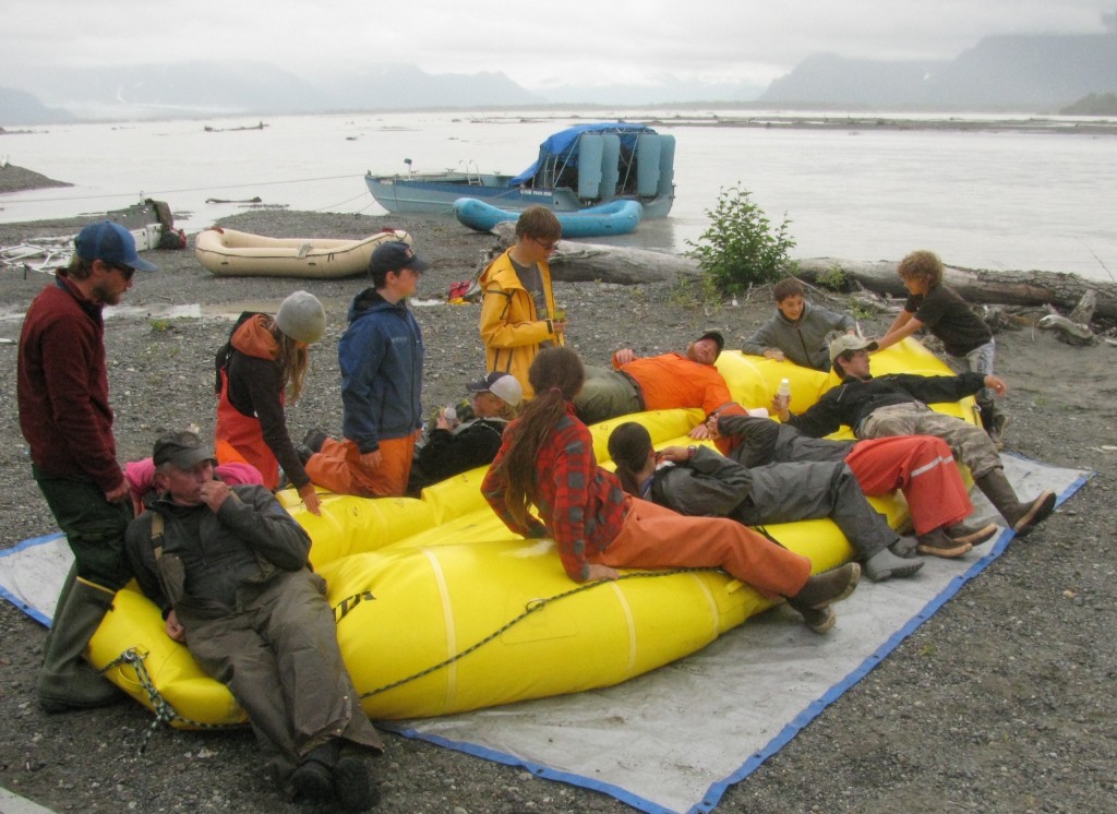 Students deflate rafts after traveling 91 miles down the Copper River as part of the Copper River Stewardship Program. Photo credit: Meadow Scott