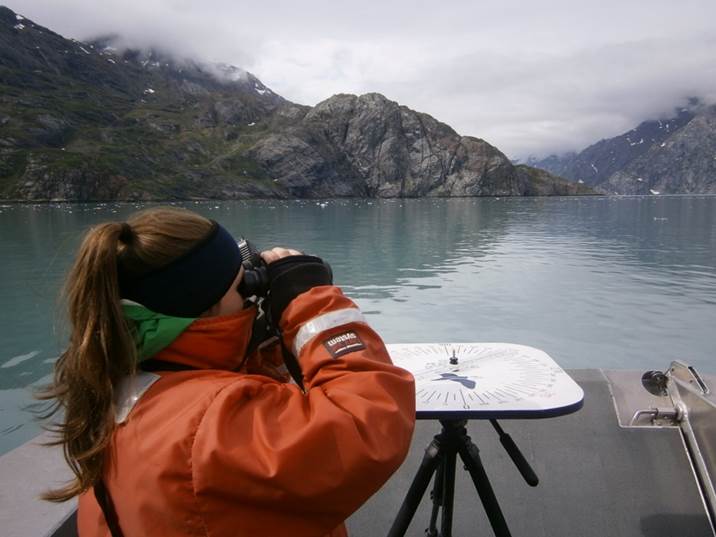 Working as an observer with SEAN scientists, Schaefer keeps her eyes on the water for seabirds in Johns Hopkins Inlet, Glacier Bay National Park and Preserve