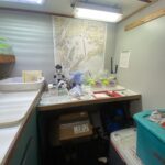 research lab: microscope, sample tubes, and other research supplies are in the photo