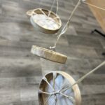 4 Alaska native drums hanging on rope to dry