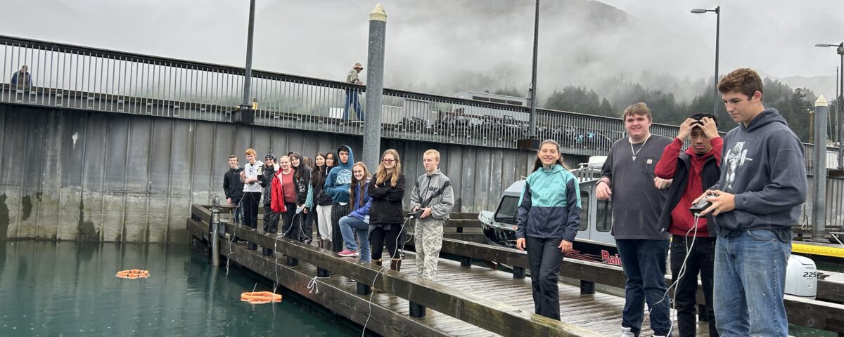 High school students at the harbor in Whittier testing their remotely operated vehicles (underwater robots) they build