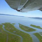 aerial photo of delta and ocean