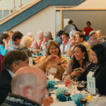 Table 13 and eleven group guests at the CRN event beginning their games.